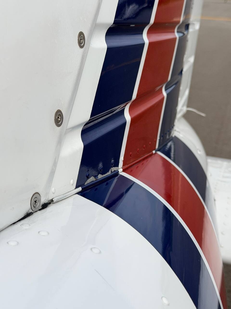 Before: localized paint degradation documented on the Piper Arrow wing surface