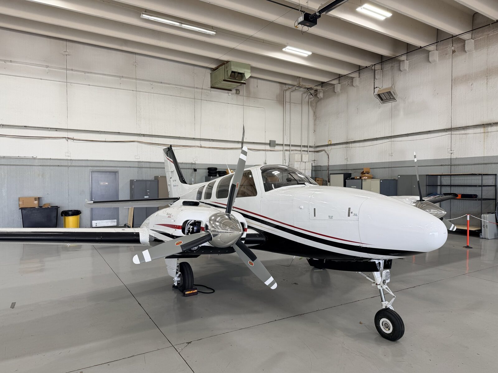 Beechcraft Baron 58 in the hangar at Chicago Executive Airport before interior reset