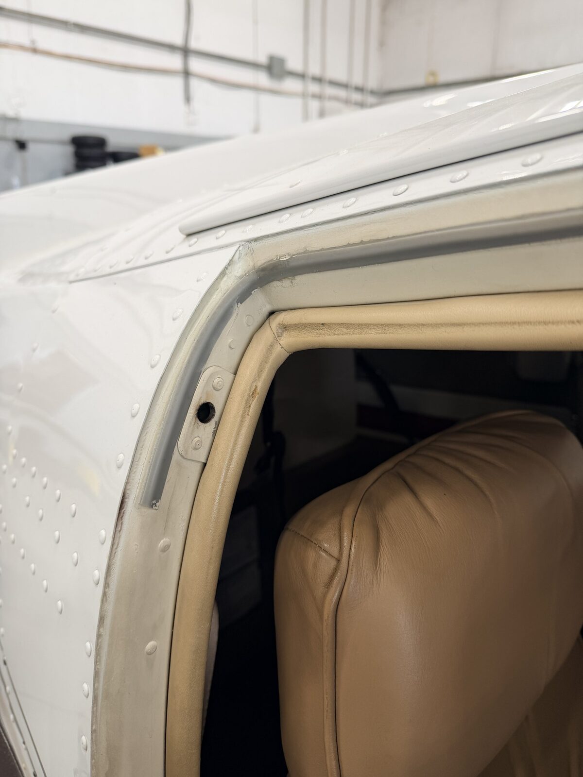 Before: cabin door seal wear and dryness documented on Beechcraft Baron 58