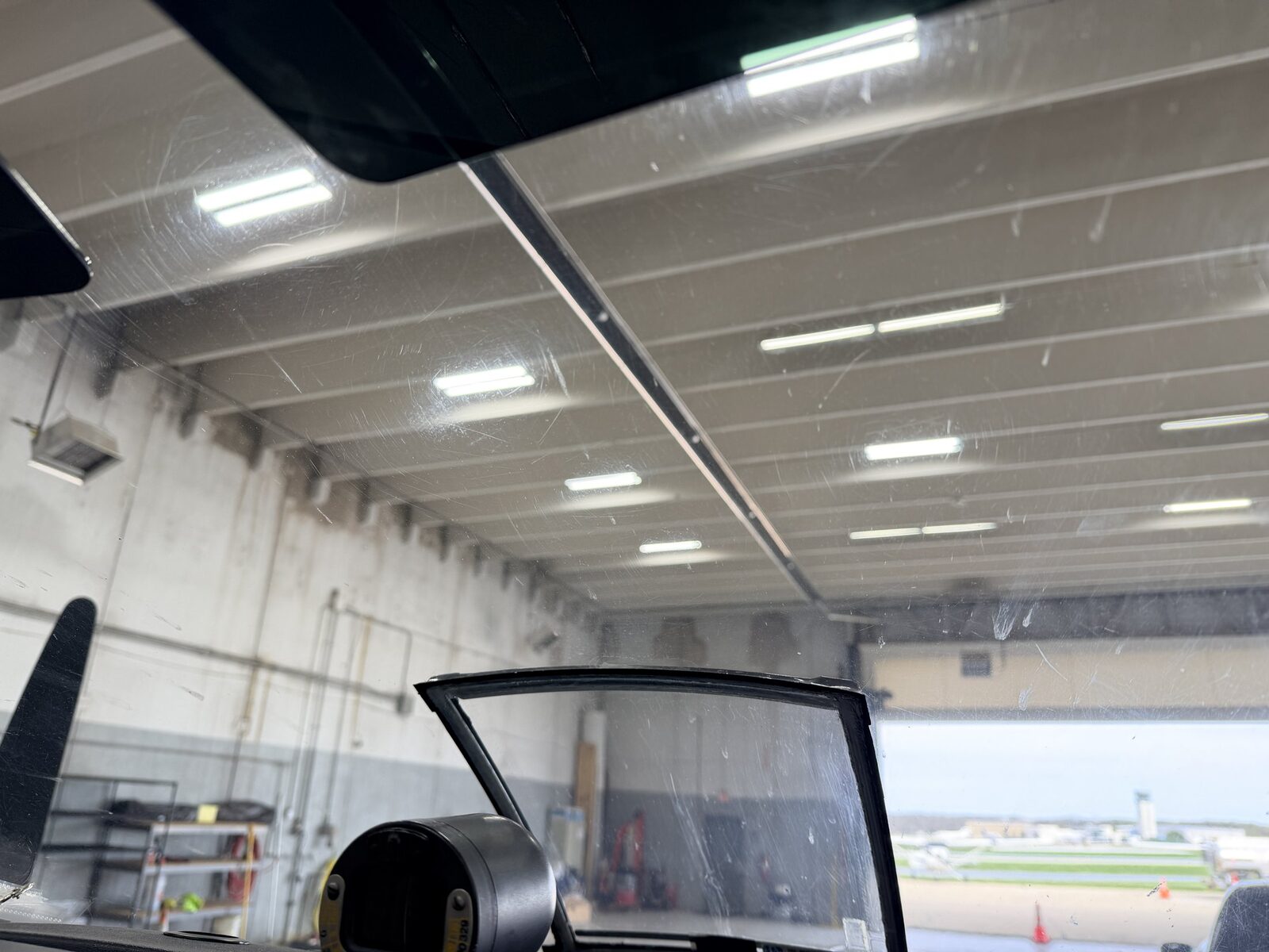 Before: windshield and side-window smudging on Baron 58 cockpit