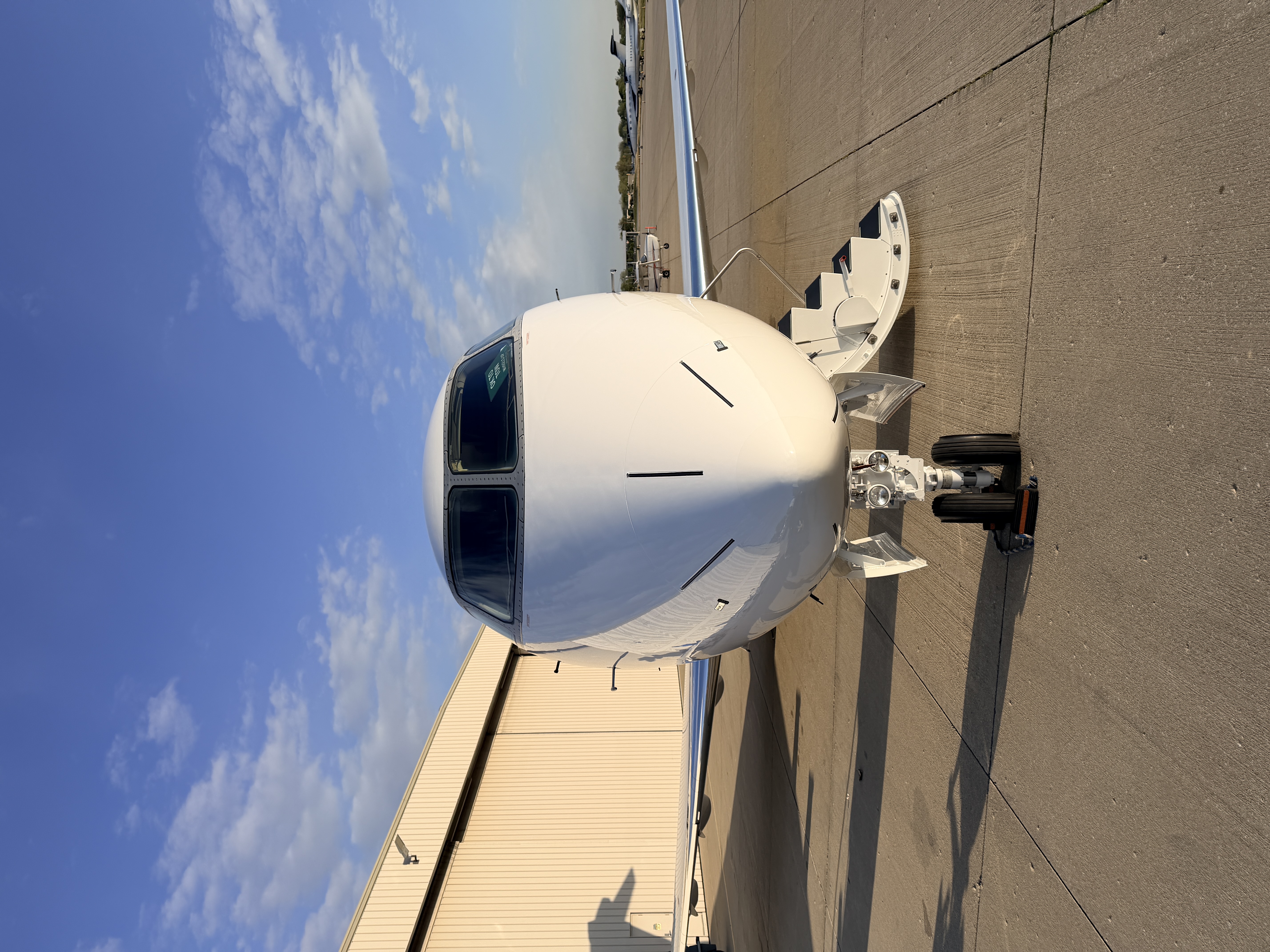 Bombardier Challenger 300 nose and cockpit on the ramp at Chicago Executive Airport after detailing