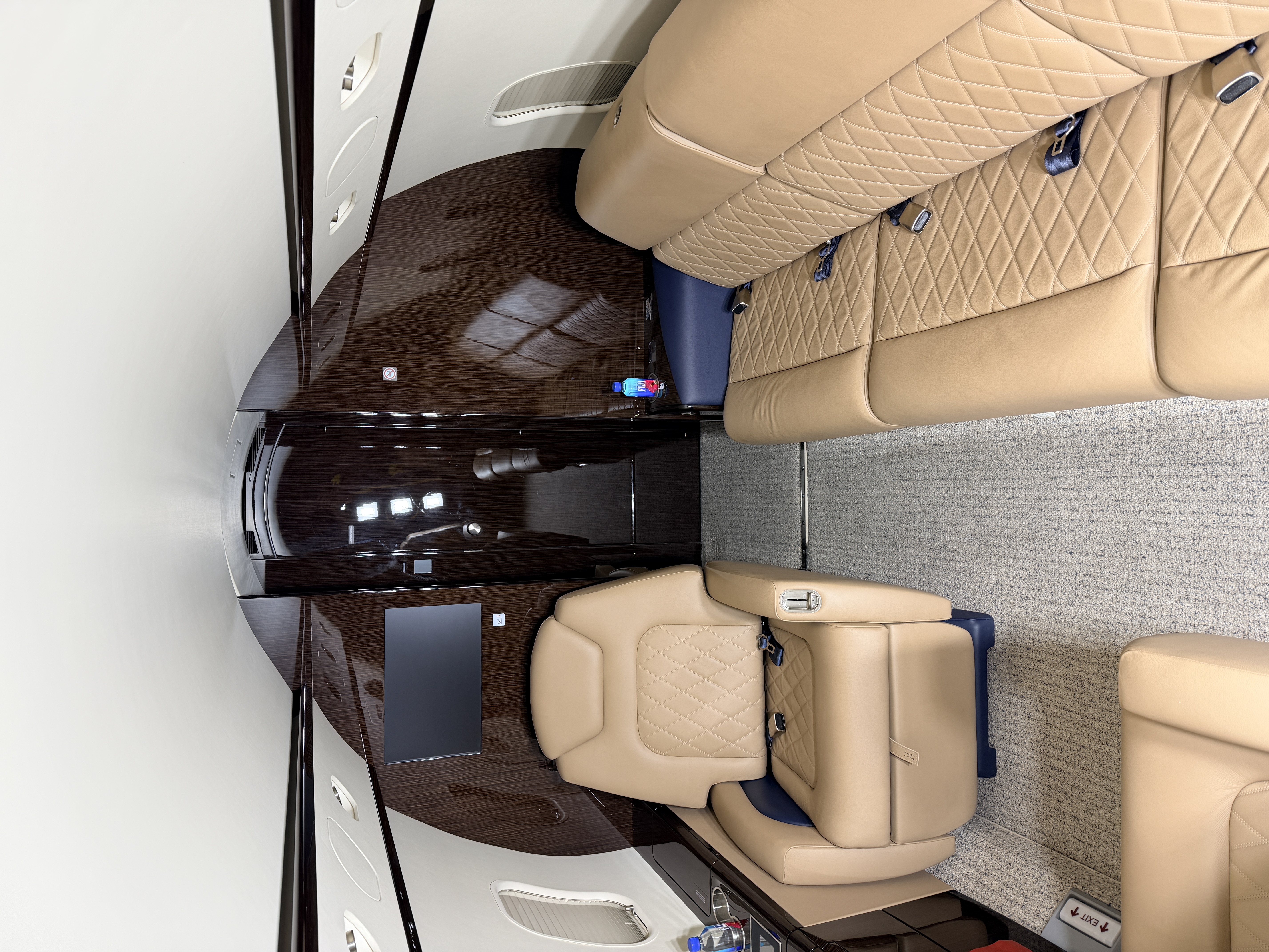 After: forward cabin carpet, seating, and woodwork presentation on the Challenger 300