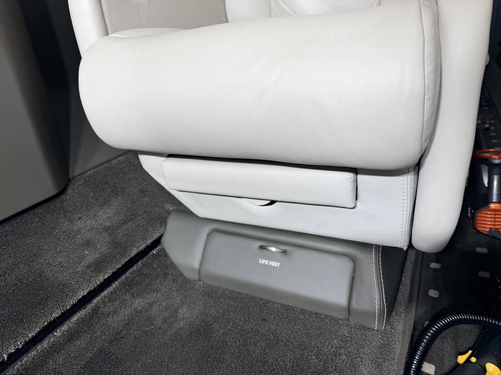 After: passenger seat base and under-seat area cleaned on Cessna Citation X