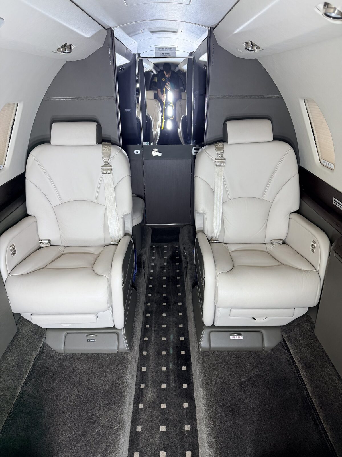 After: Cessna Citation X cabin fully reset with clean carpet and conditioned leather