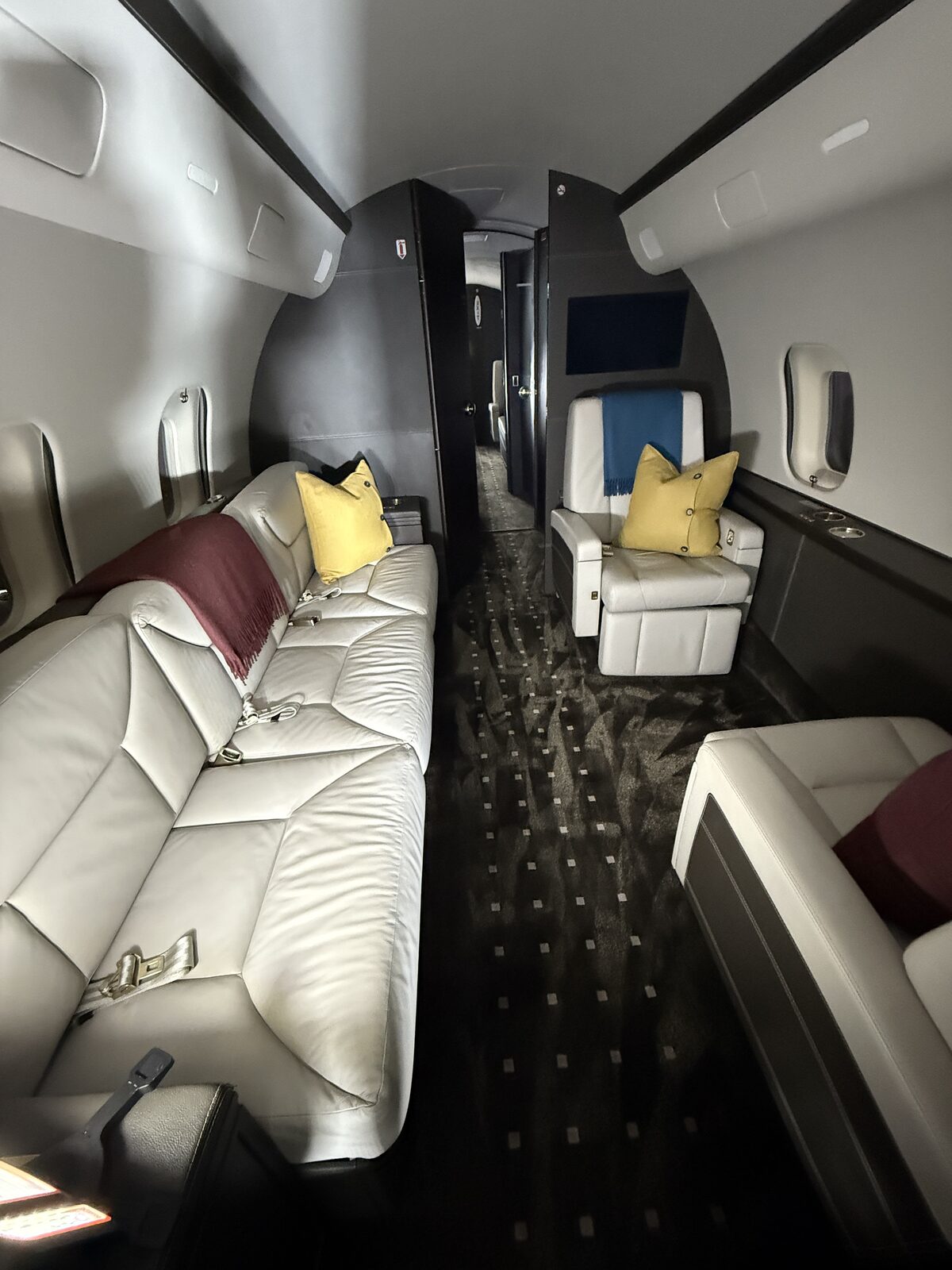 After: rear couch seating and passenger presentation reset on Global 5000