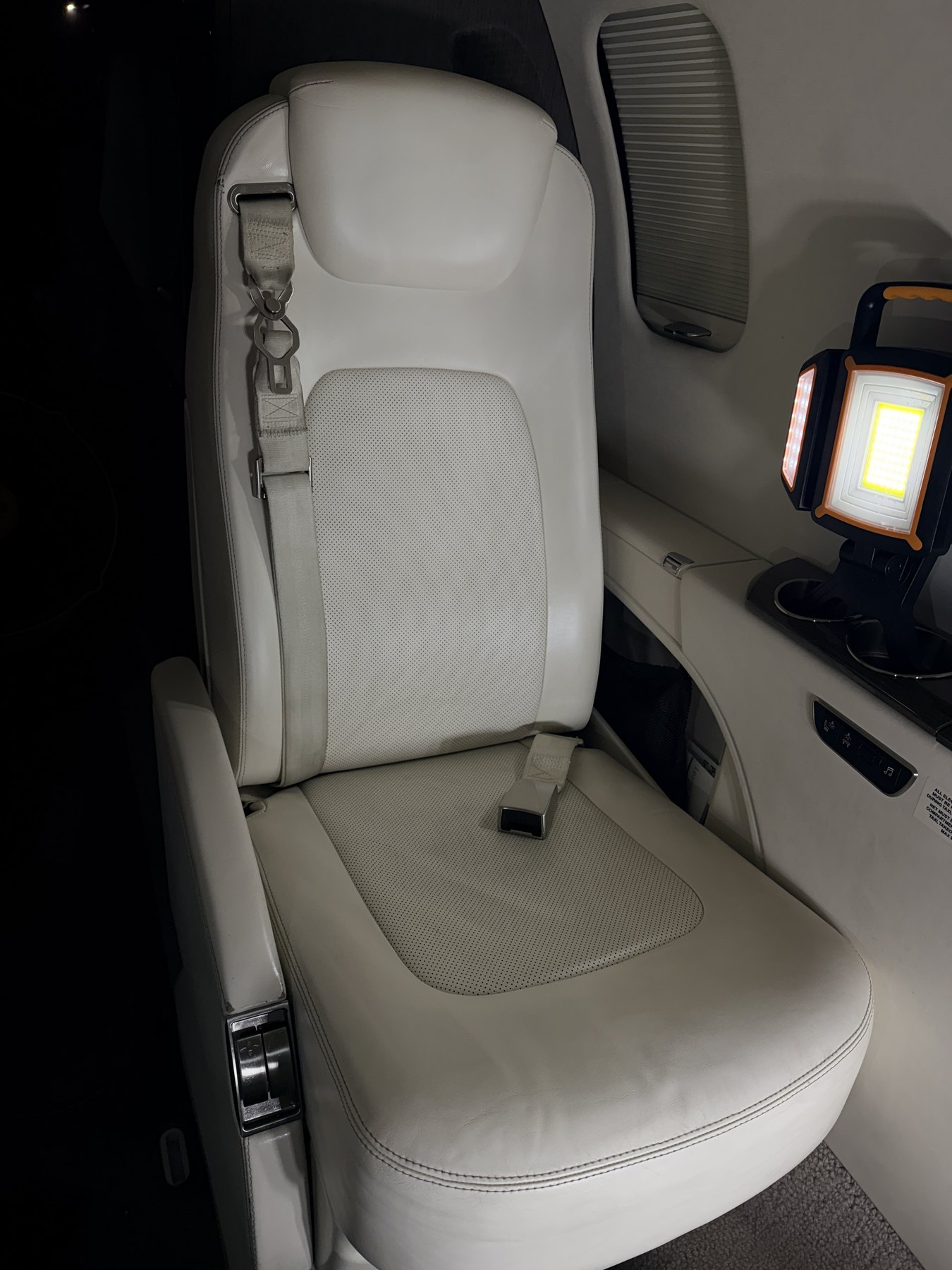 After: passenger-seat leather after conservative surface cleaning