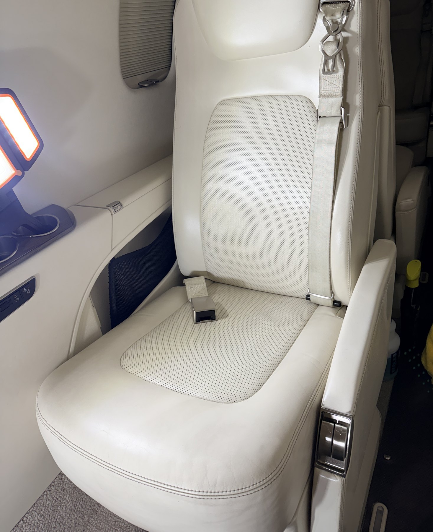 After: passenger seat and belt reset following cleaning on Learjet 75