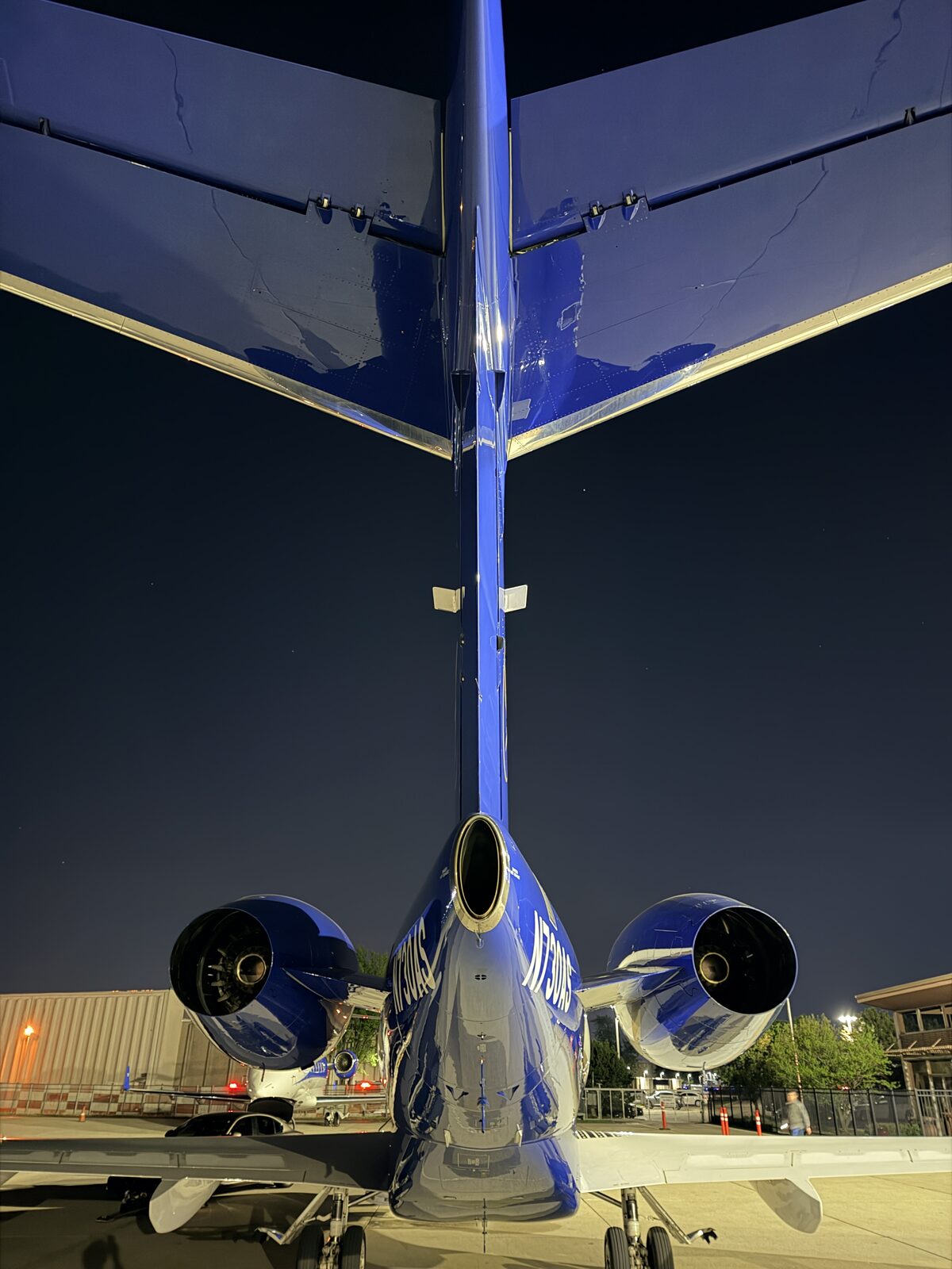Bombardier Challenger 300 tail T-tail dual engines rear view ramp night exterior detailing Chicago
