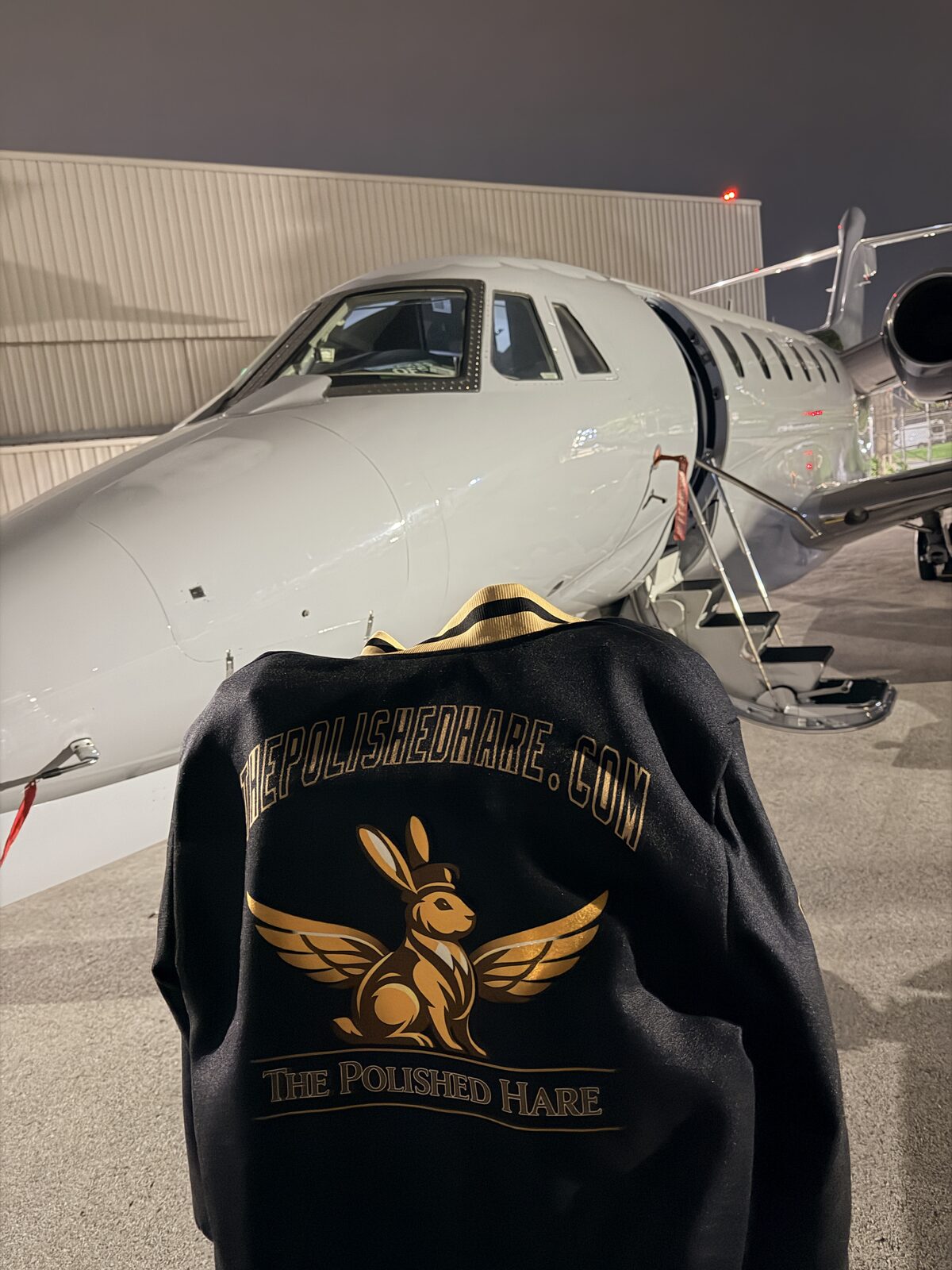 Cessna Citation X nose The Polished Hare branded hoodie ramp night aviation detailing Chicago