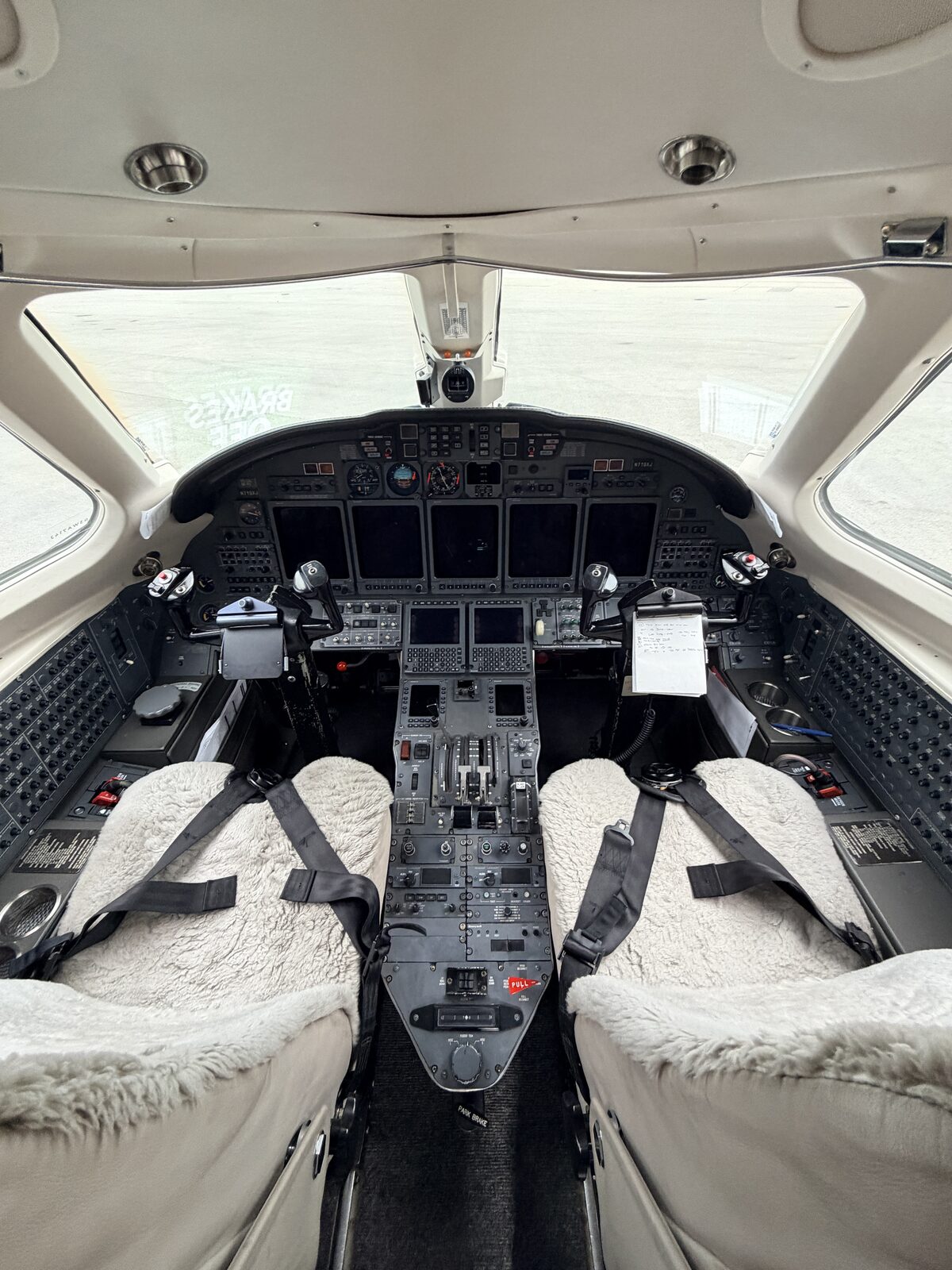 Cessna Citation X cockpit flight deck instrument panel yokes sheepskin seat covers interior detailing
