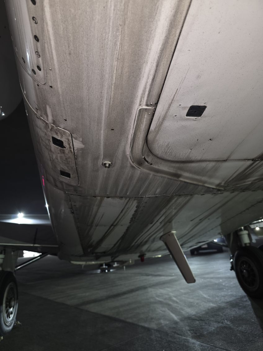 Bombardier Challenger 600 dirty belly underside before degreasing Chicago