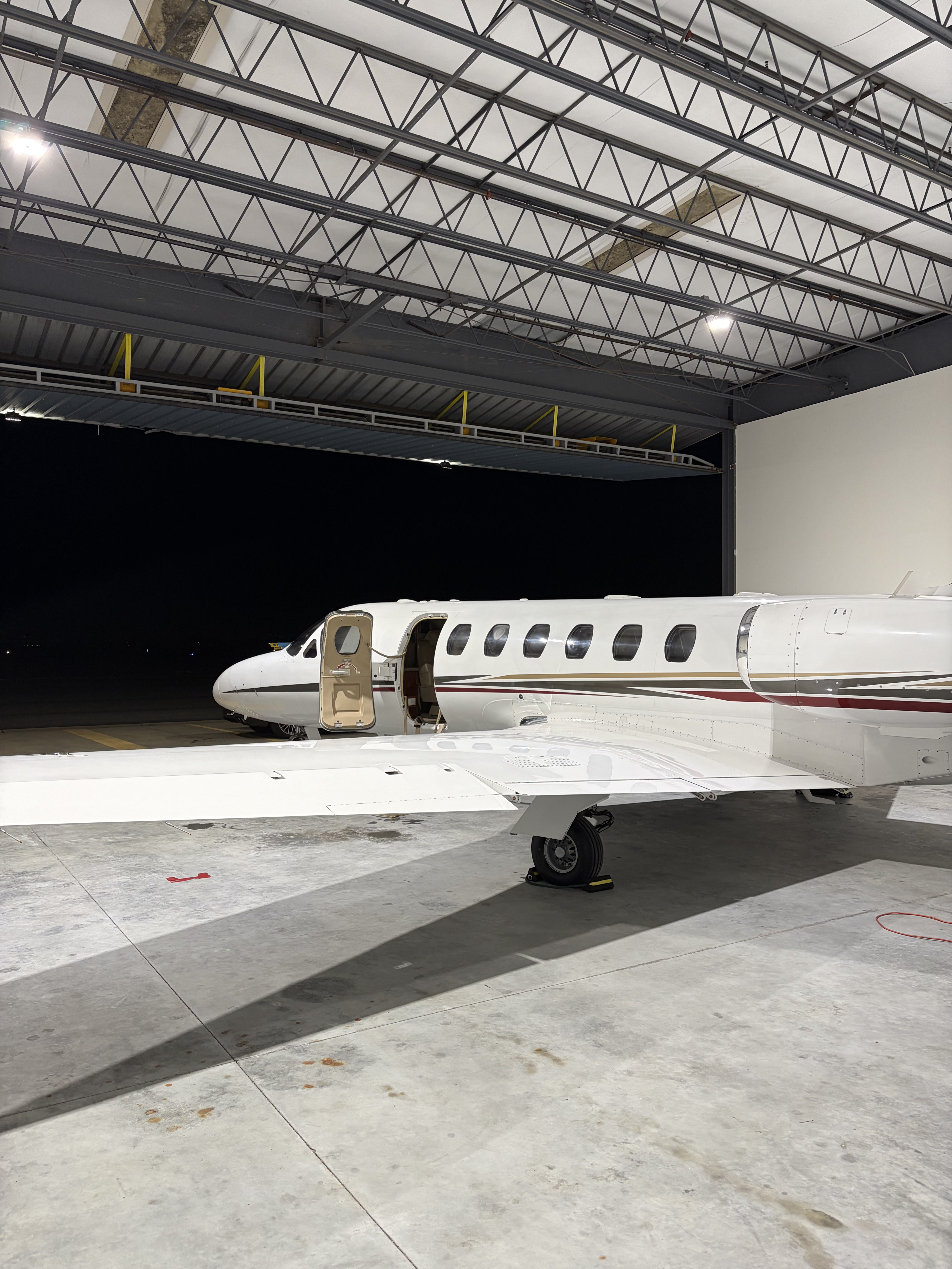 Light jet full exterior detailing in climate-controlled hangar Chicago