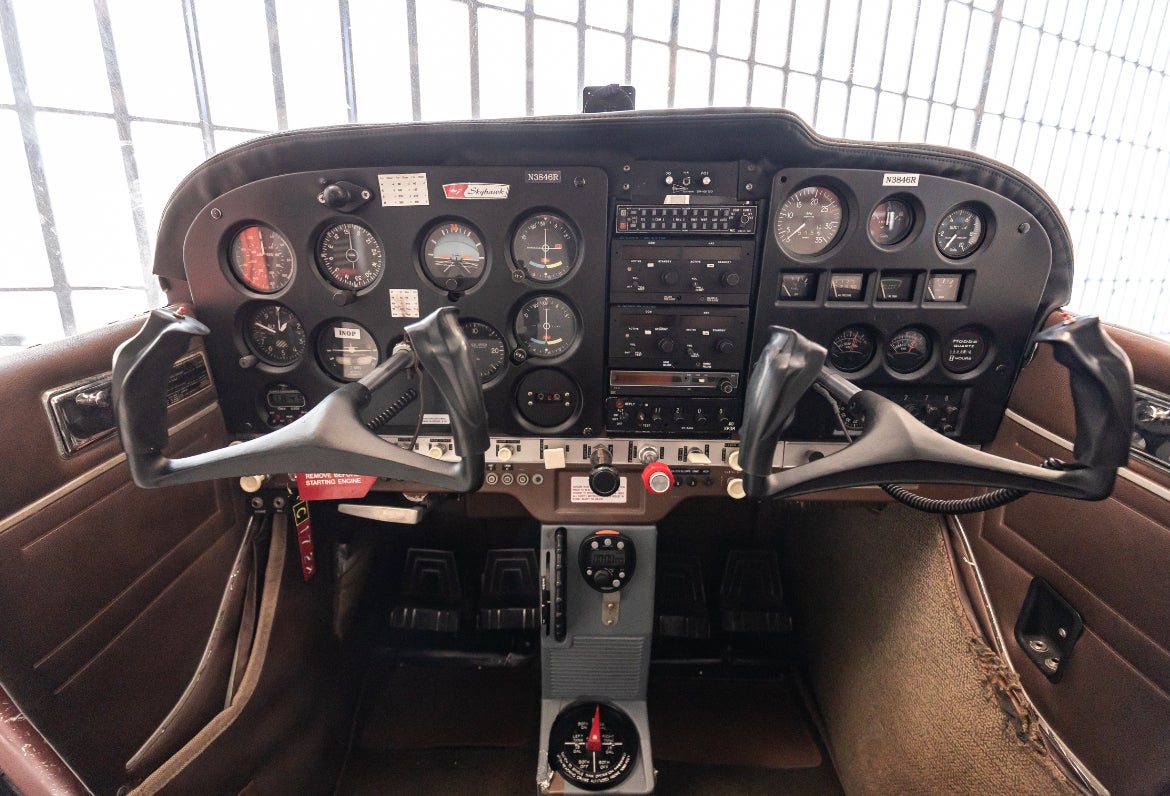 Clean Cessna 172 cockpit interior maintained by professional aviation detailing in Chicago