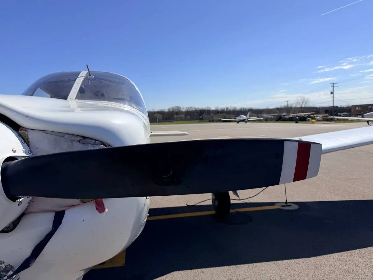 Piper Arrow trainer on the ramp at DuPage Airport showing wing surface condition before detailing