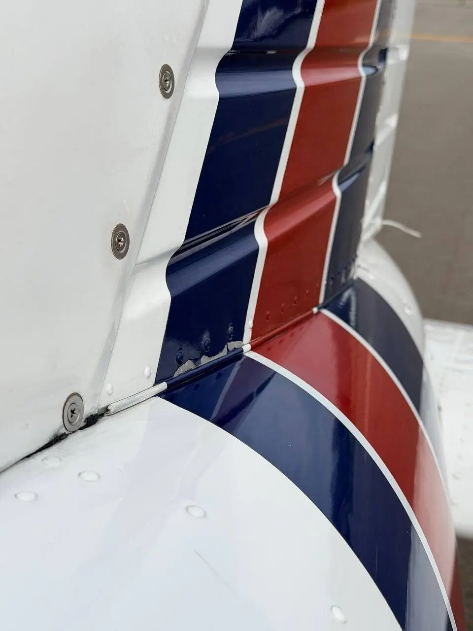 Before: localized paint degradation documented on the Piper Arrow wing surface