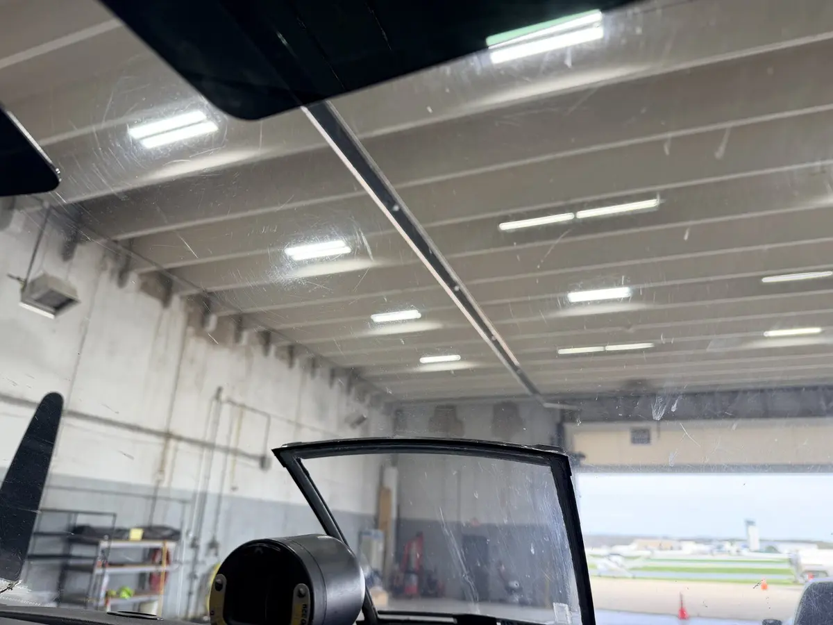 Before: windshield and side-window smudging on Baron 58 cockpit