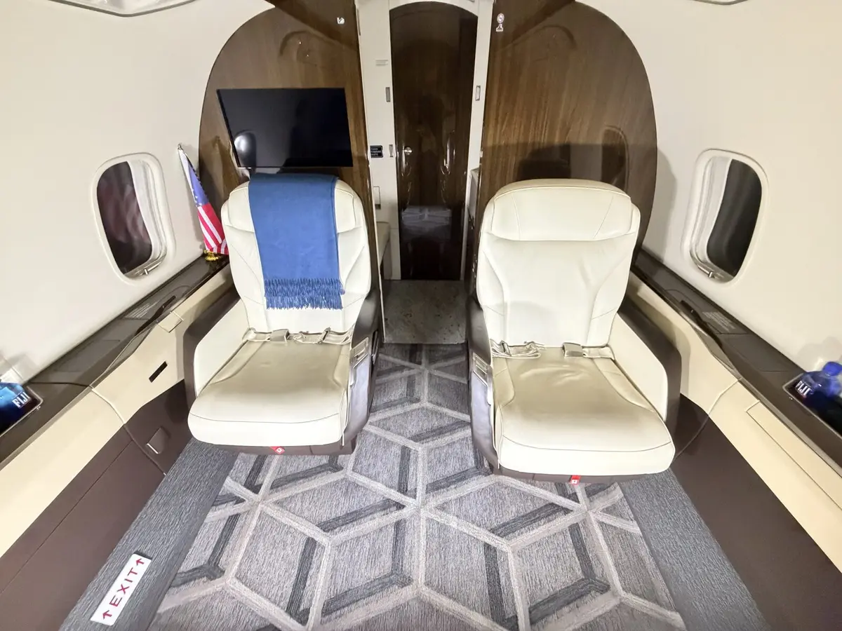 After: forward cabin reset after interior detailing and carpet work on Challenger 300