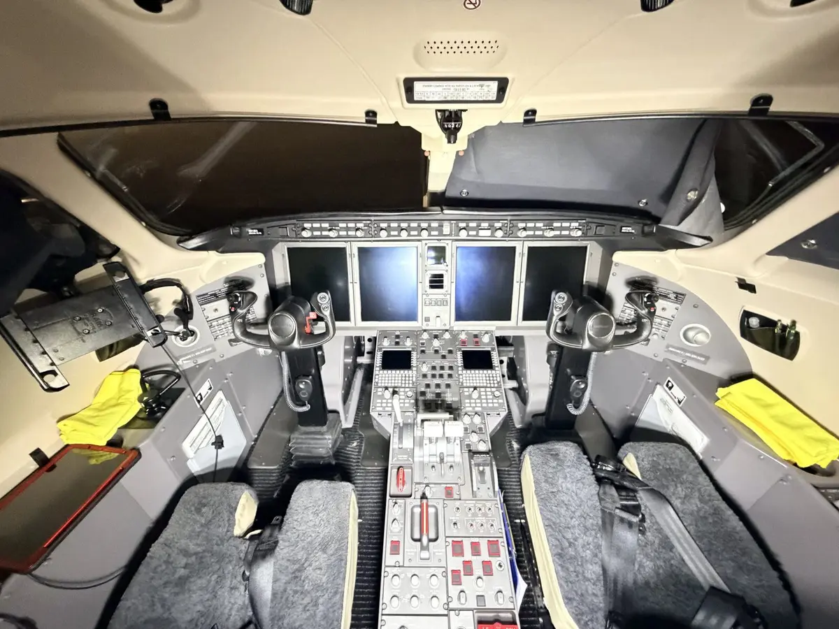 After: cockpit reset with restrained flight-deck handling on Challenger 300