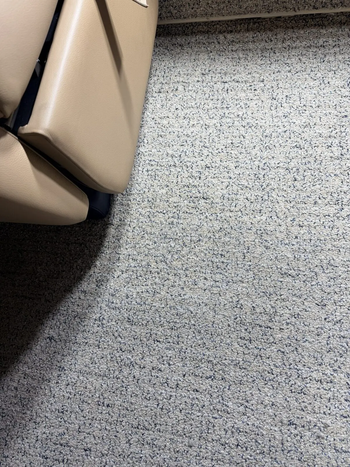 After: under-seat carpet area following extraction on the Challenger 300