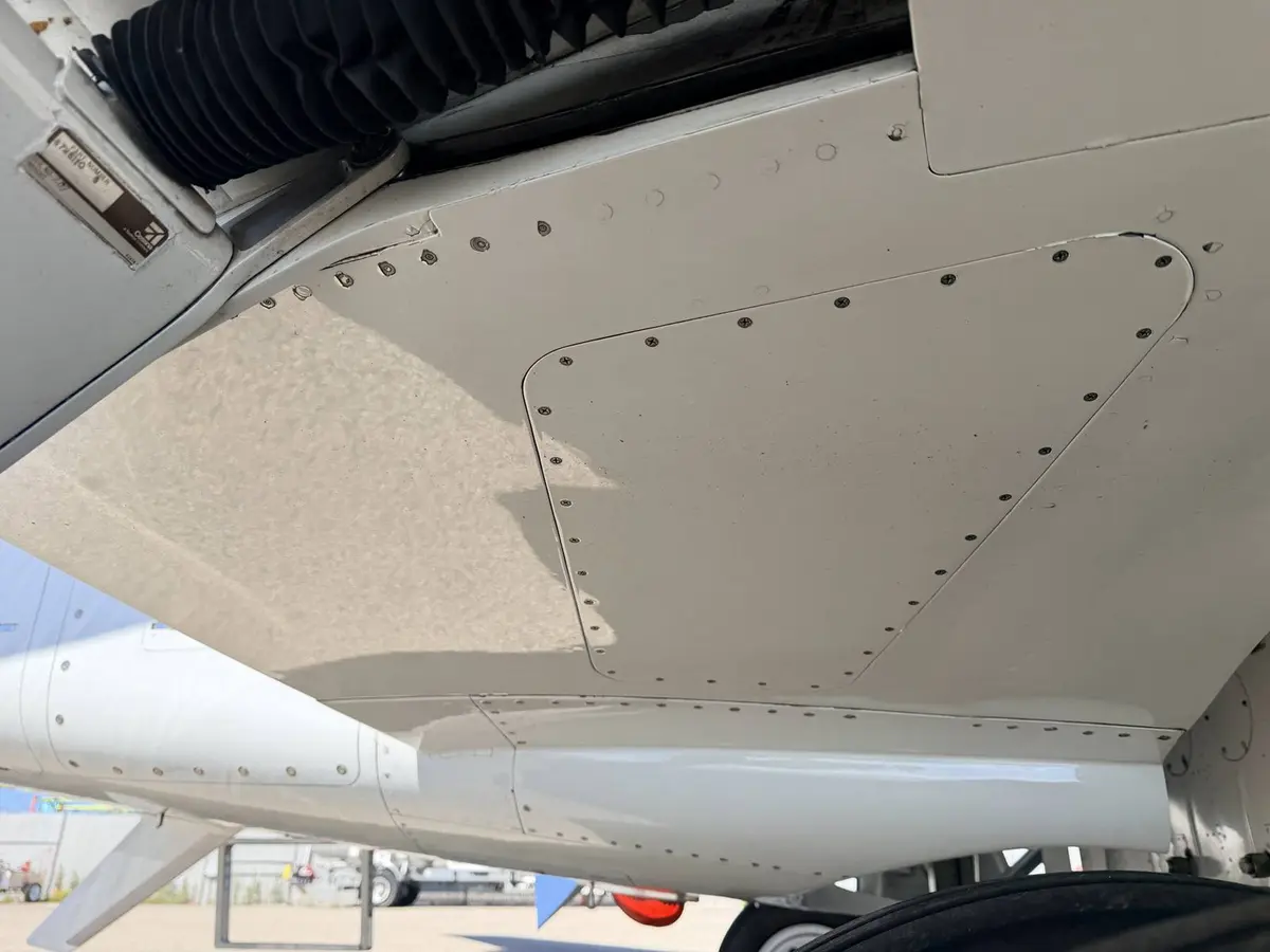 Cleaned underbelly access panels and tailcone area on Cessna Citation X after exterior wash