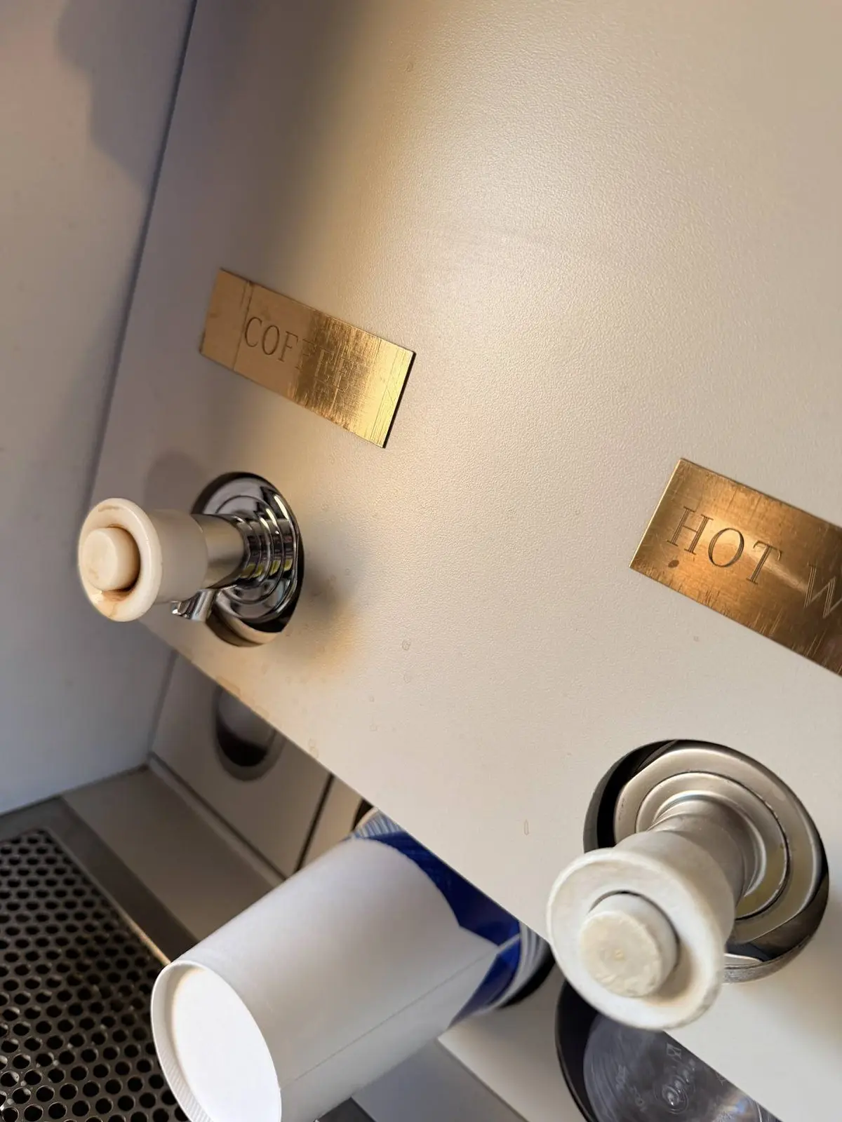 Galley brightwork with polished coffee and hot water service fixtures in Cessna Citation X