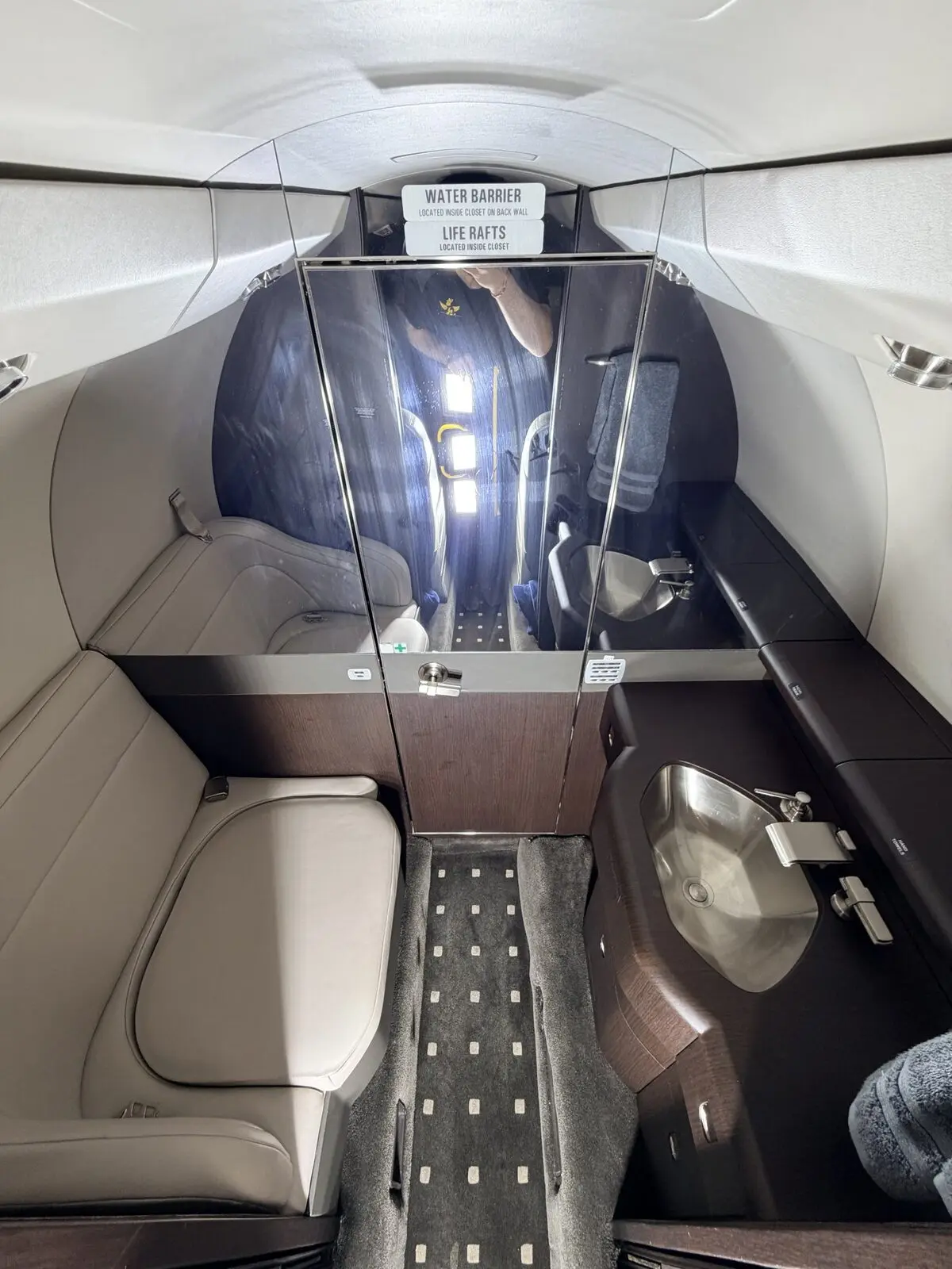 Before: Cessna Citation X cabin aisle and rear seating area showing use-related buildup