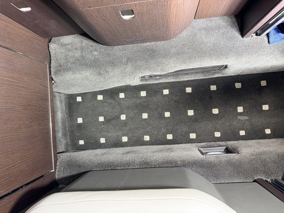 Before: forward cabin carpet staining on Cessna Citation X