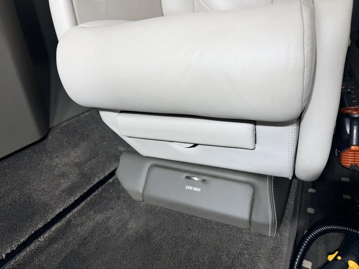 After: passenger seat base and under-seat area cleaned on Cessna Citation X