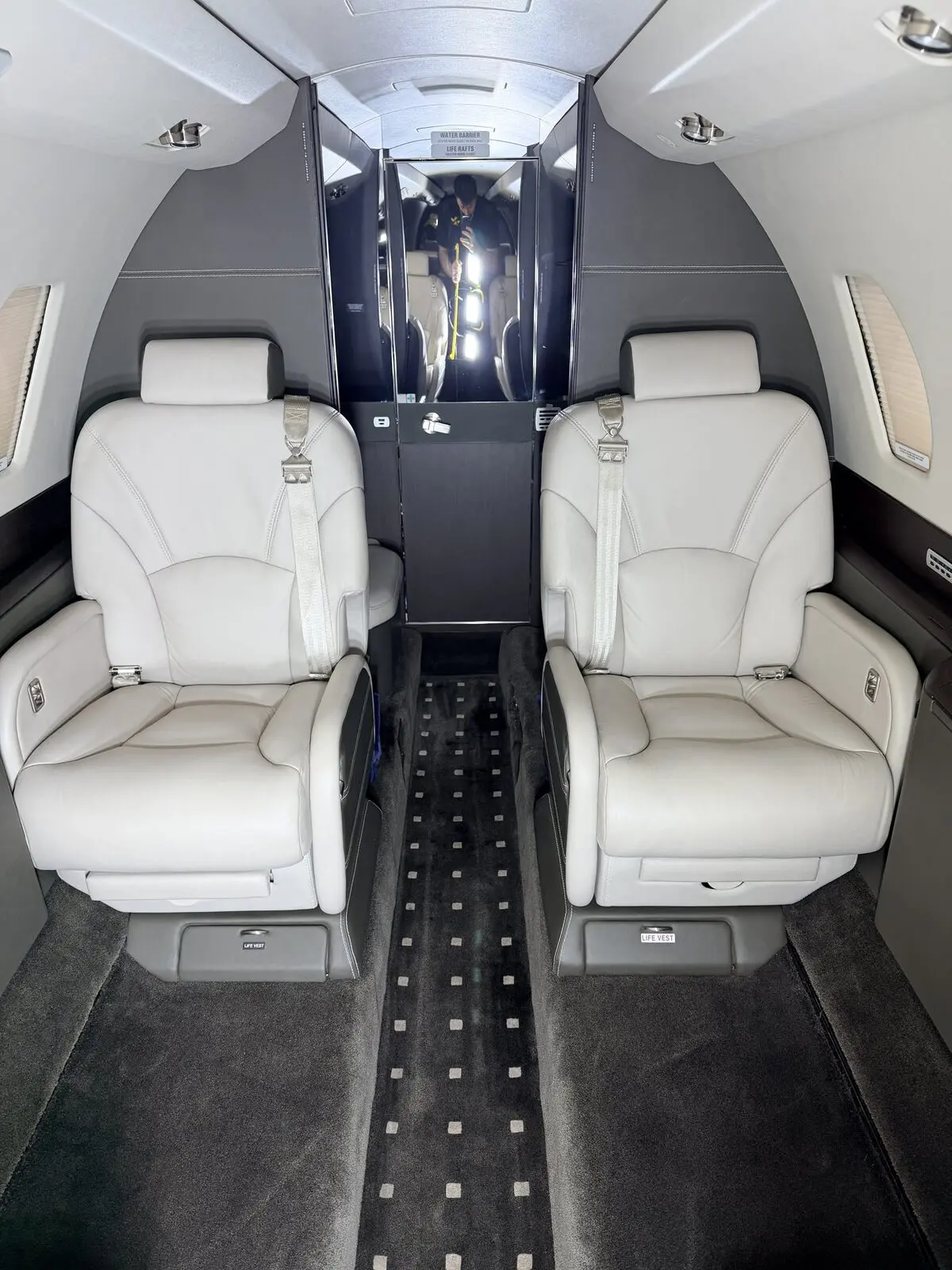 After: Cessna Citation X cabin fully reset with clean carpet and conditioned leather