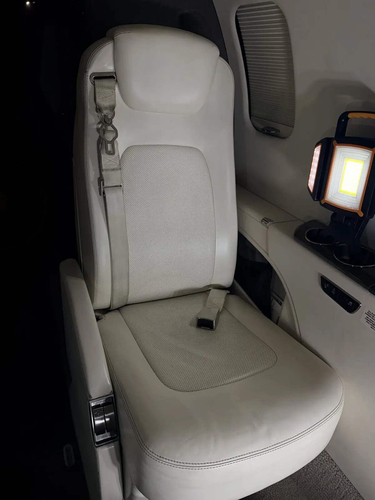 After: passenger-seat leather after conservative surface cleaning