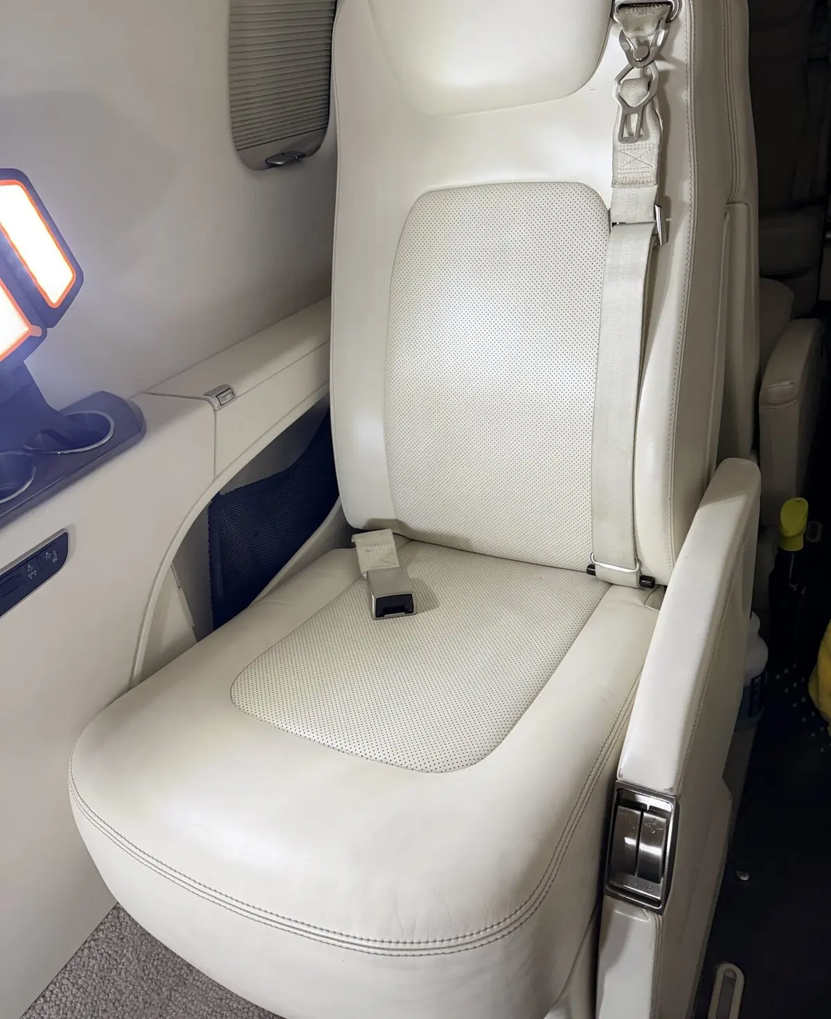 After: passenger seat and belt reset following cleaning on Learjet 75