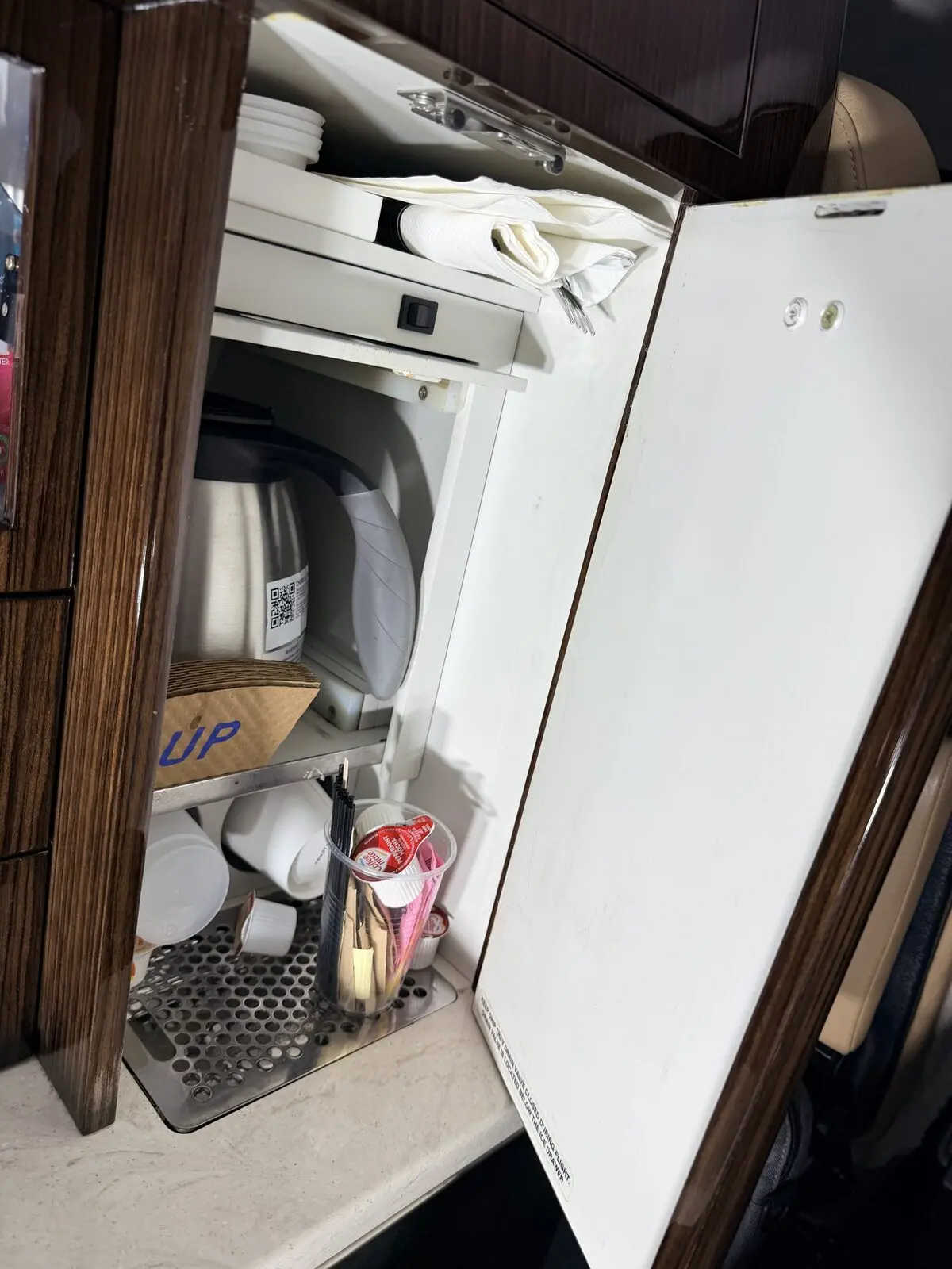 Before: galley and coffee area with staining and catering residue
