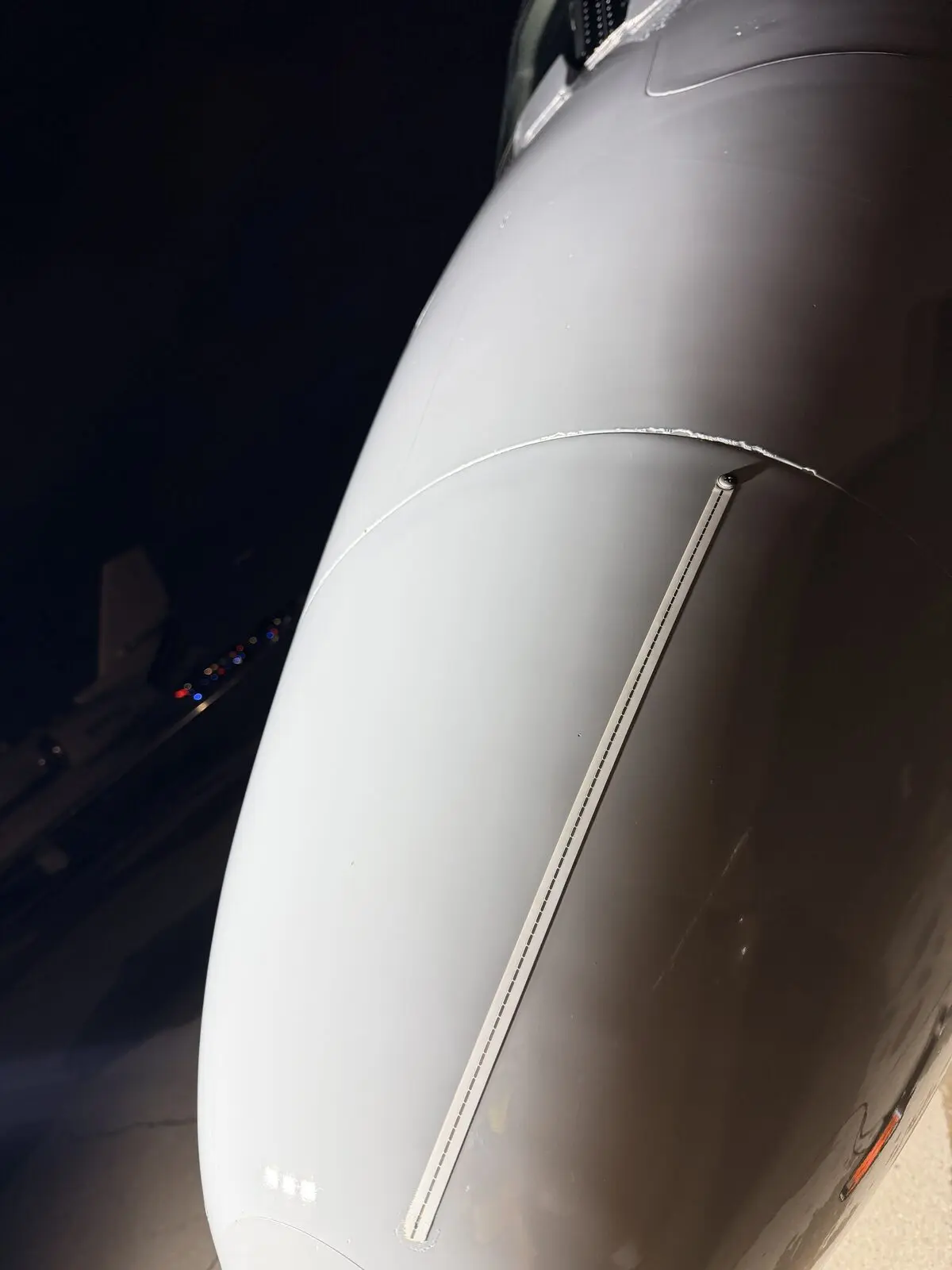Cessna Citation X wing de-ice boot and leading edge after conditioning and exterior detail at night