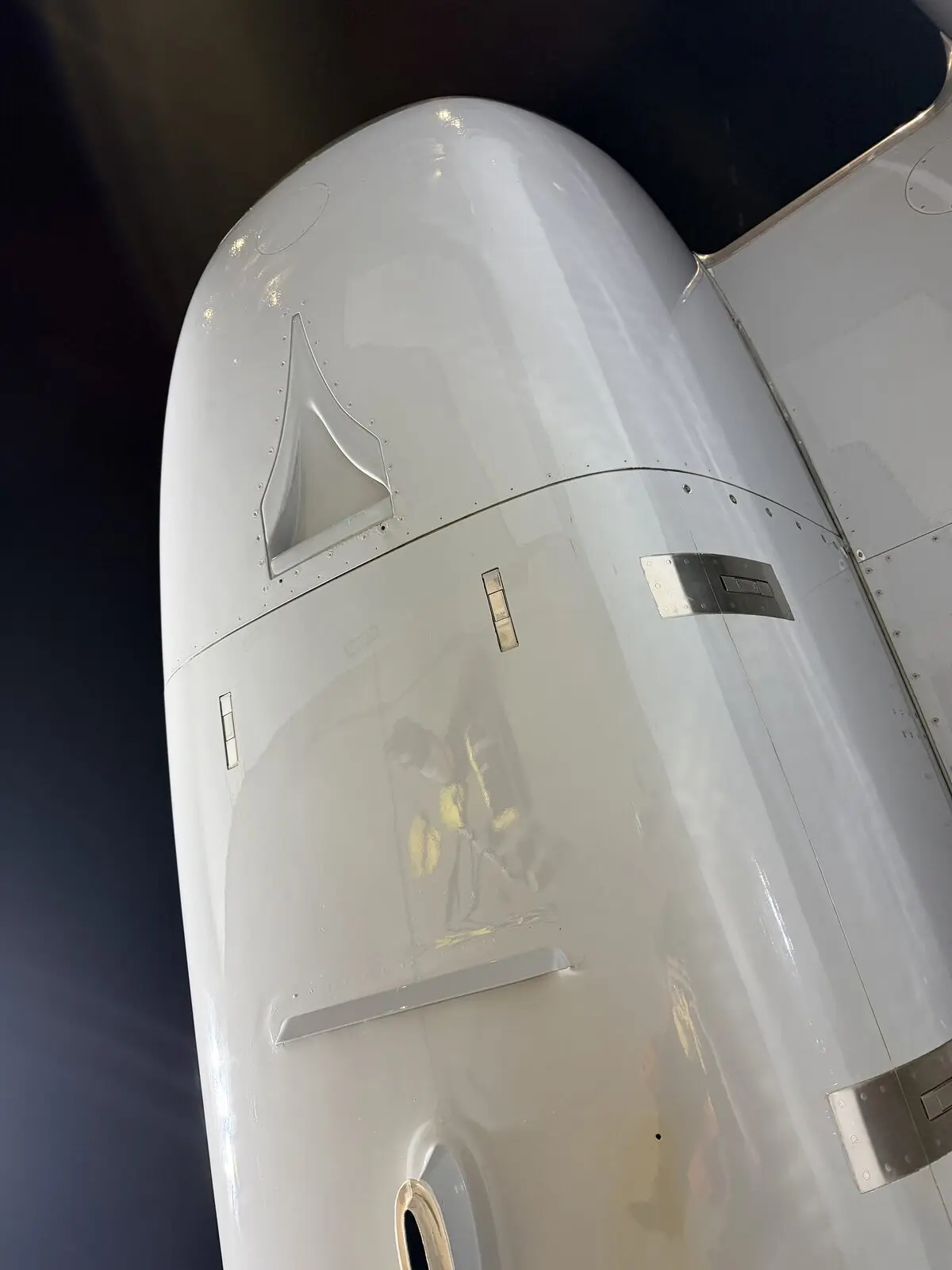 Cessna Citation X lower fuselage belly fairing and ventral fin area after exterior detail and degreasing